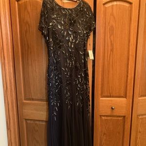 Mother of the Groom floor length beaded dress in twilight color , never worn .
